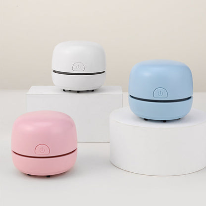 Mini Desktop Vacuum Cleaner with Long Battery Life—Perfect for Both Desktop and Car Use! With powerful suction, it effortlessly cleans hard-to-reach spots.